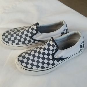Checkered Vans slip ons
